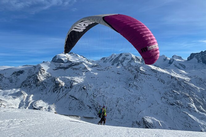 20 to 25 Minute Tandem Paragliding in Zermatt and Matterhorn View - Getting fitted out for an alpine flight