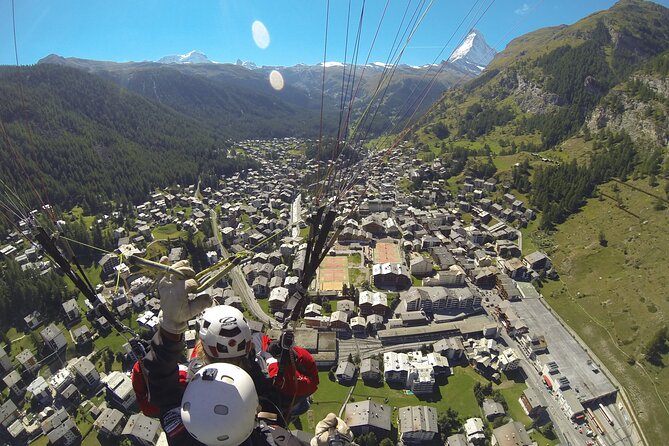 20 to 25 Minute Tandem Paragliding in Zermatt and Matterhorn View - Landing near Zermatt and the victory drink