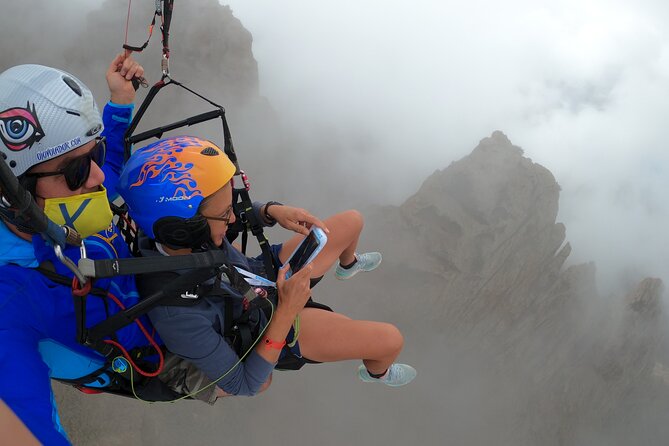 Acrobatic Paragliding Flight with Spanish Champion in Tenerife - Timing, weather, and cancellation