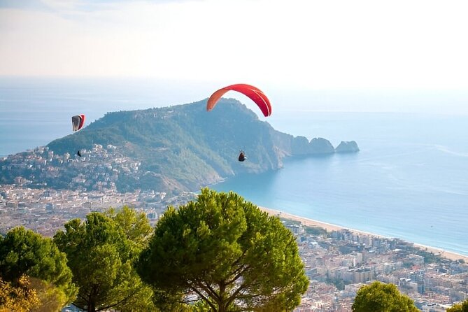 Alanya Paragliding Experience By Local Expert Pilots W/ Transfer - Landing, photos, and the extra costs
