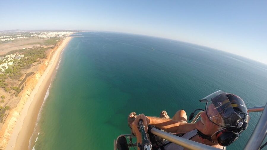 Albufeira: Sunset Paragliding Flight - Vilamoura golf courses and marina from the air