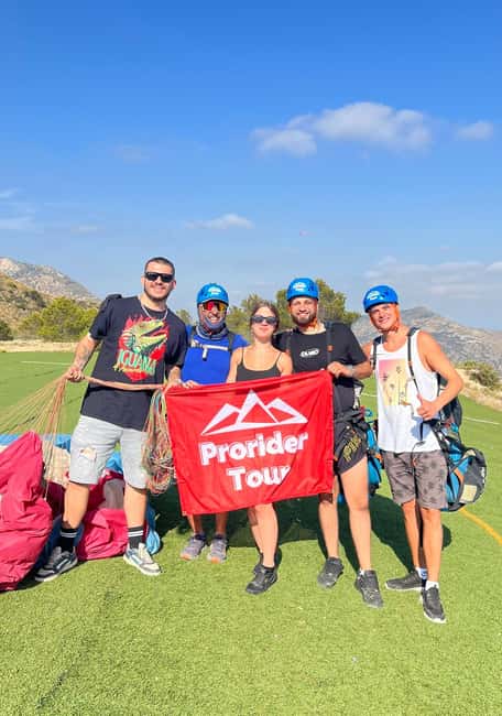 Alicante: Santa Pola, Benidorm Tandem Paragliding Experience - Preparing for takeoff with JuanPe and the team