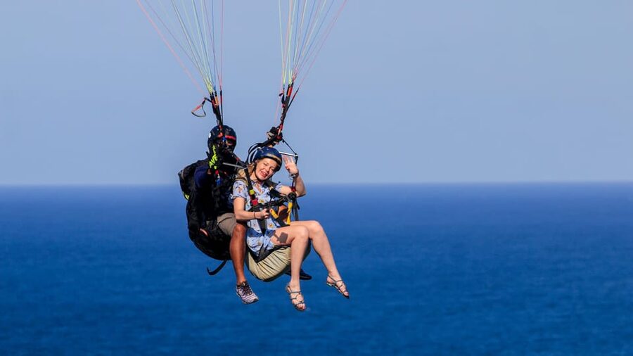 Bali: Nusa Dua Tandem Paragliding with Certified Pilot - Taking off from Gunung Riug