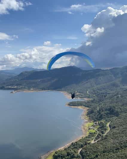 Bogota: Paragliding activity in La Calera with transfers - Preparing for takeoff near Tominé Reservoir