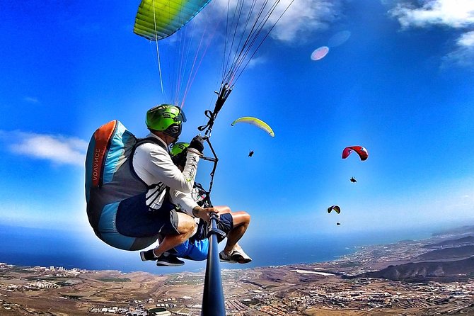 BRONZE tandem paragliding flight in South Tenerife, free pick up - Gliding toward La Caleta beach