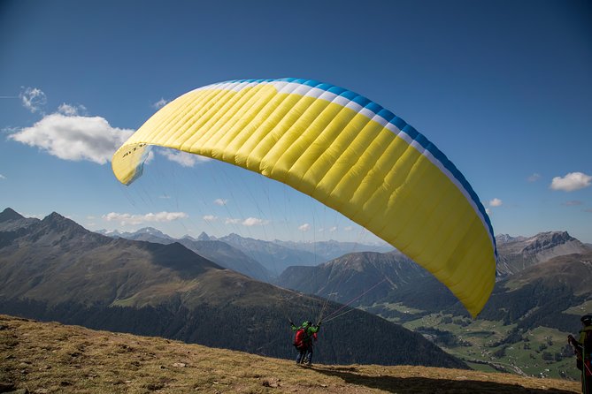 DAVOS: Paragliding Tandem Flight In Swiss Alps (Video & Photos Included) - The pilot and the tandem setup