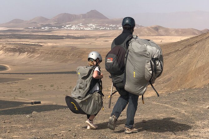 DISCOVERY FLIGHT tandem paragliding Lanzarote with pro pilot - Leaving Teguise for the ocean and lava fields