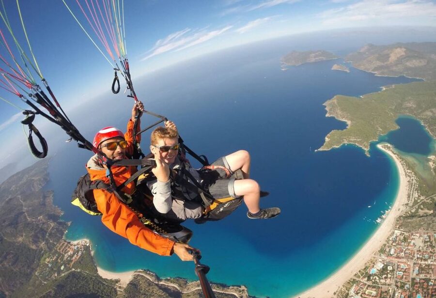 Fethiye: Tandem Paragliding Experience w/Hotel Pickup - From Fethiye hotel pickup to the mountain road