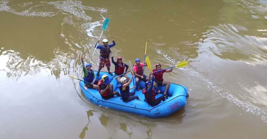 From Medellín: Paragliding and Rafting Combo Tour - From Medellín to an Antioquia canyon