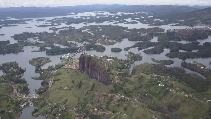 From Medellín: Paragliding Flight and Guatape Tour - Climbing the Stone of Guatapé
