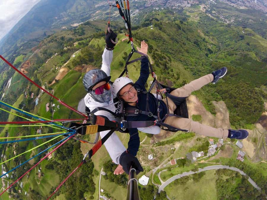 From Medellín: Paragliding Tour with GoPro Photos & Videos - Asking for tricks, music, and more camera time