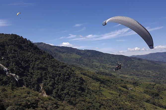 Fun RAFTING + Awesome PARAGLIDING over giant waterfalls from MEDELLIN - From Medellín to Cocorná by 9:30 a.m.