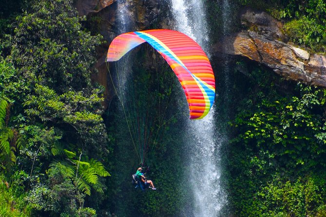 Fun RAFTING + Awesome PARAGLIDING over giant waterfalls from MEDELLIN - The mountain lunch stop is optional