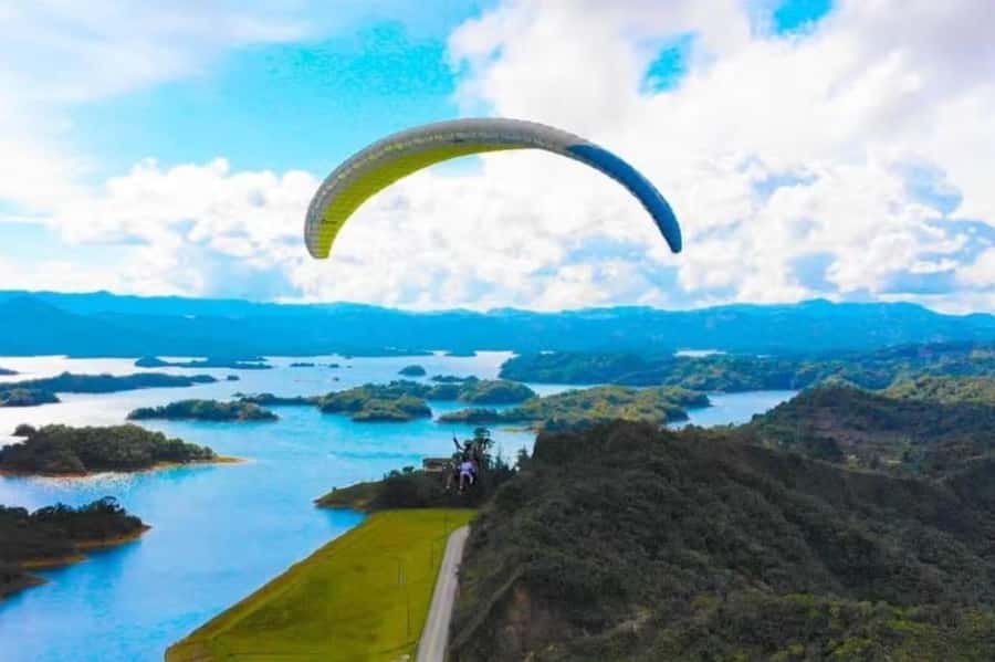 Guatape: Paragliding Experience - Taking off above Guatapé