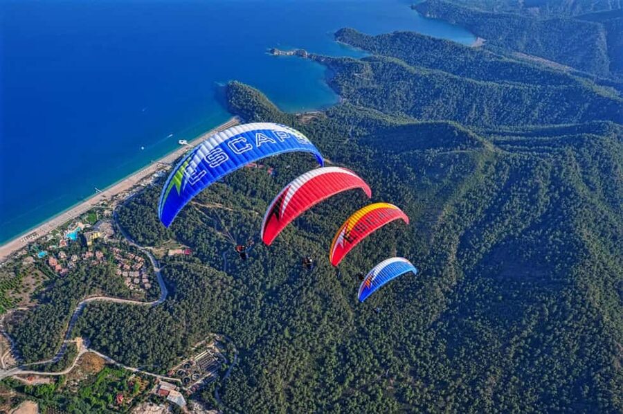 Kemer: Paragliding with Hotel Transfer & Cable Car - Mount Tahtalı turns a cable car ride into a flight