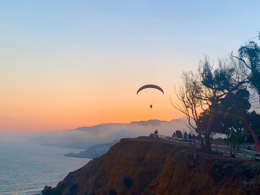 Malibu Hills to Beach: Tandem Paragliding Flight Adventure - Taking off from the grassy hills
