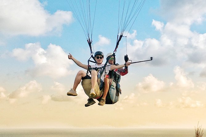 Paragliding Bali Nusa Dua cliff with Free Photo/Videos - A bird’s-eye view from Bali’s southern cliffs