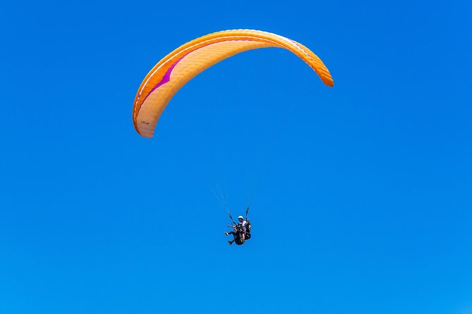 Paragliding tandem flight 1.500 ft & up - What to wear and what to bring
