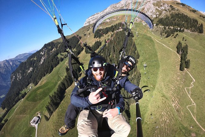 Paragliding Tandemflight Lucerne - Engelberg - Engelberg, the abbey, and Mount Titlis views
