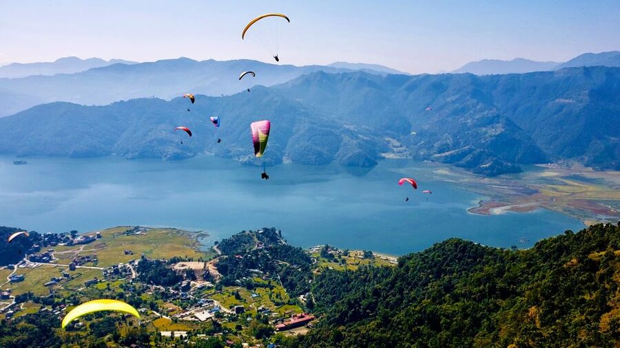 Pokhara: Paragliding Adventure with Photos and Video - Taking to the air above Pokhara