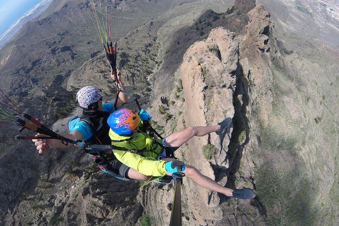 Premium Paragliding in Tenerife : Photos, videos and pickup included - The views: Teide, coast, and a quiet Atlantic