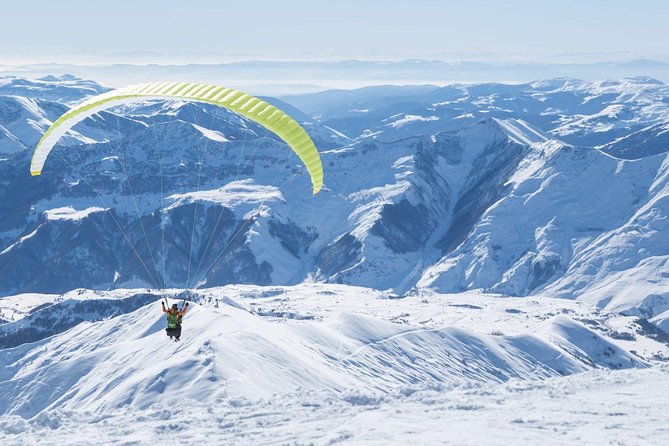 Private Full Day Tour In Kazbegi - Gudauri (Paragliding & Rafting) - Guides, vehicle, and the private format