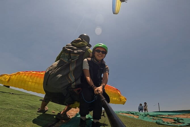 Tandem Paragliding Experience in Hanoi - Meeting the pilot and preparing to fly