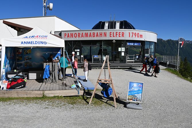 Tandem paragliding in the Stubai Valley near Innsbruck - The flight: glacier, valley, and town views