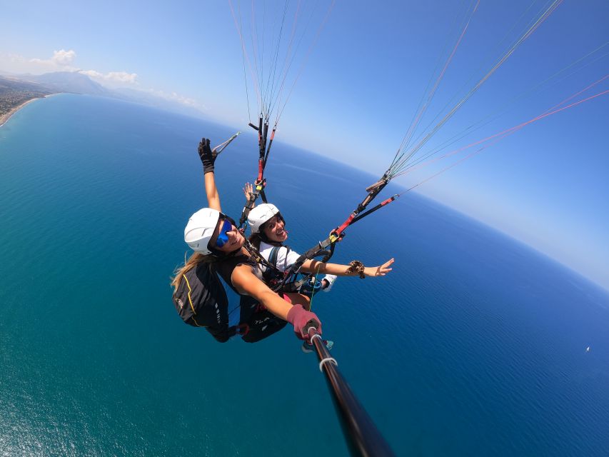 Taormina: Paragliding Tour with Instructor and GoPro Video - A gentle landing on the beach