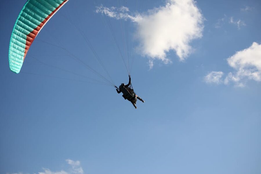 Trapani: Paragliding flight with GoPro photos and videos - Timing, transport, and weather considerations