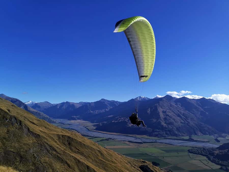 Wanaka: Tandem Paragliding Experience - Takeoff begins at the Treble Cone road
